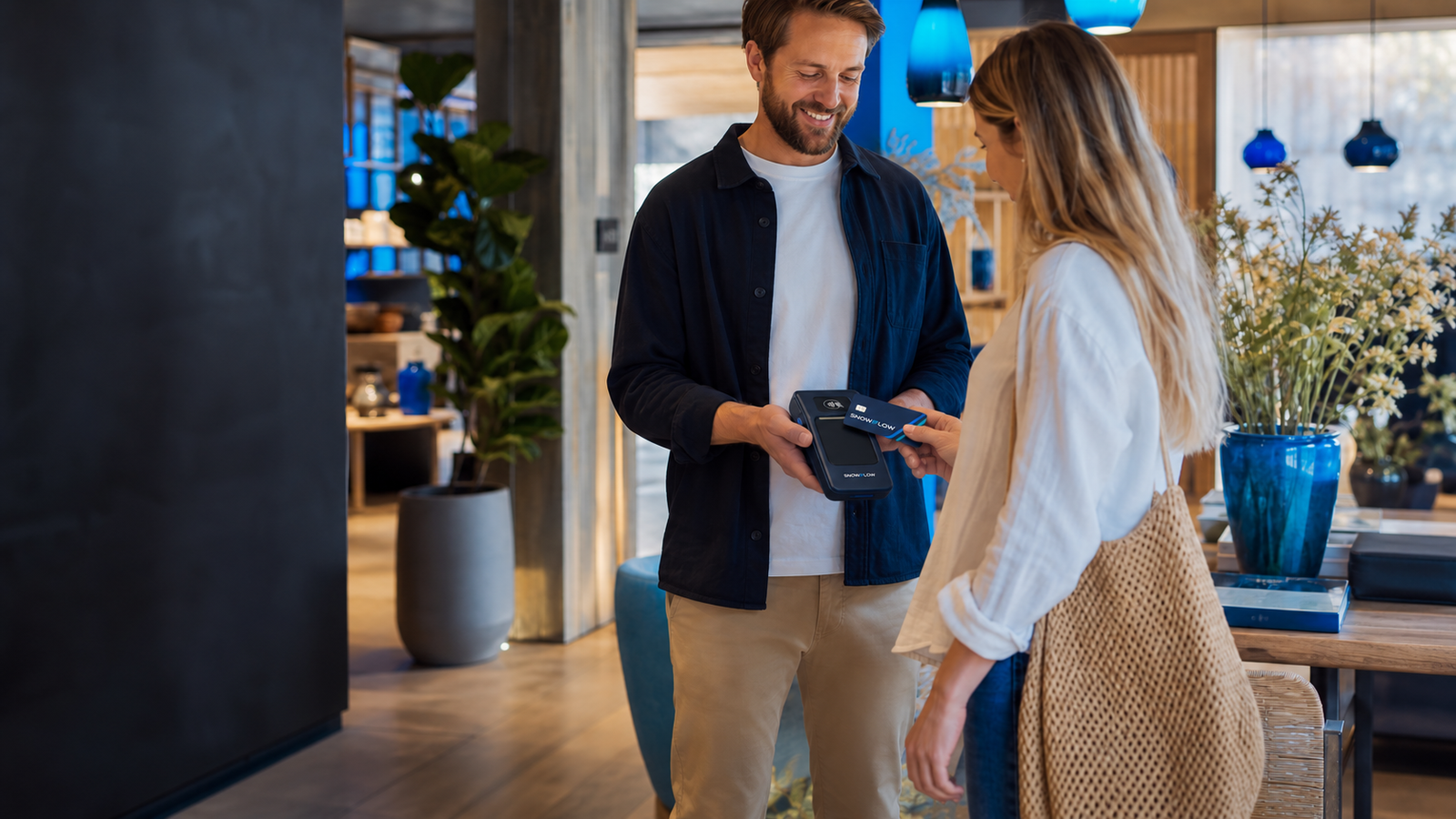 A customer making a contactless payment in a contemporary independent business